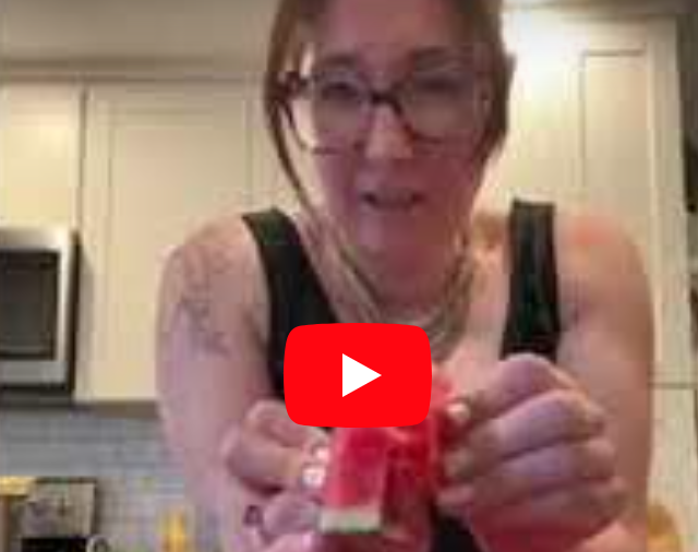 woman showing fake food